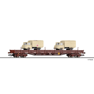 Niederbordwagen Res 3936 der DR, beladen mit zwei LKW...